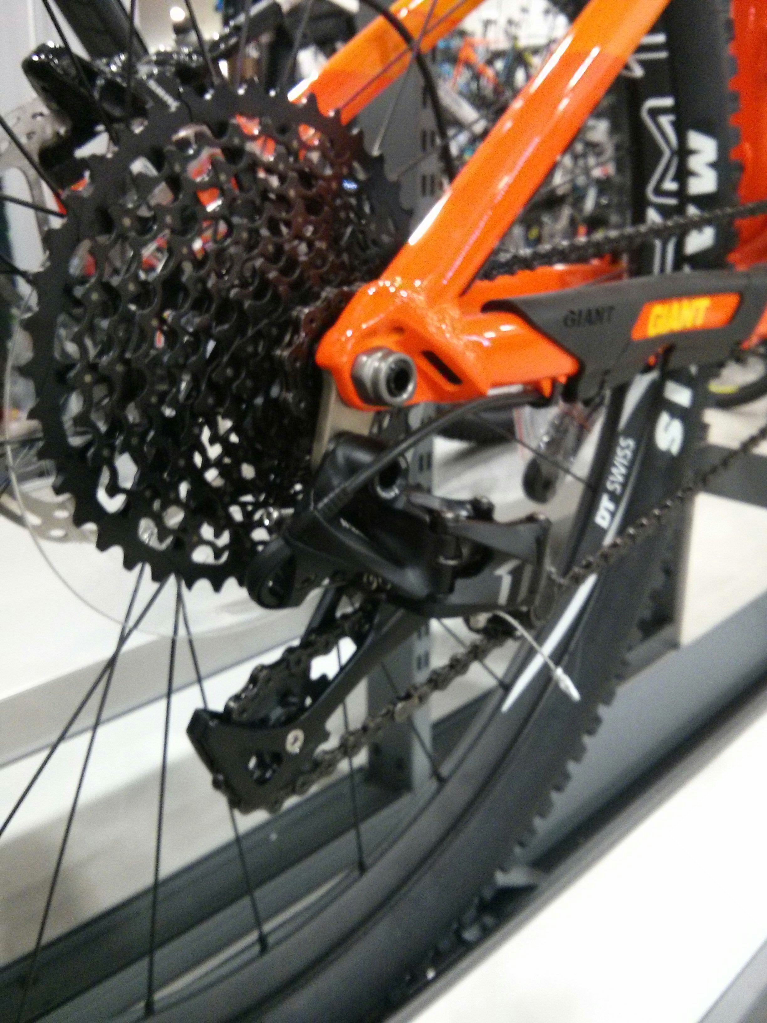11 speed systems such as SRAM's XO1 use a wide range cassette to maintain a usable range of gears.